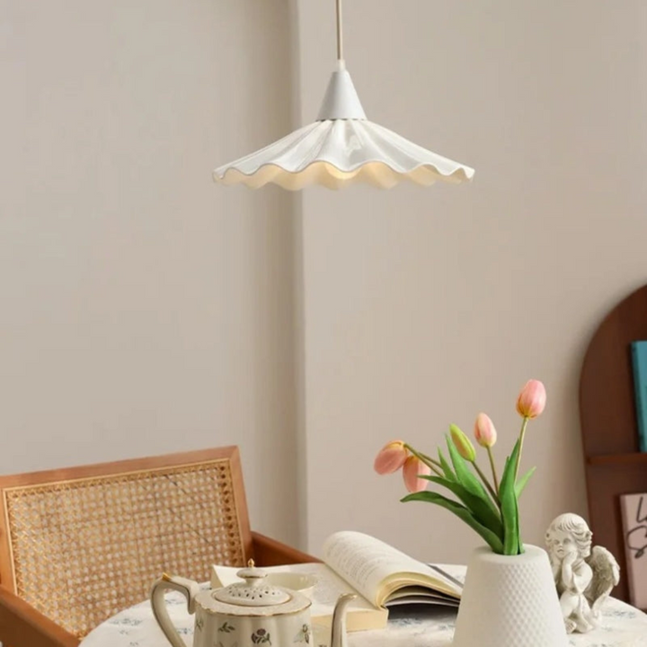 White ceramic ribbed pendant lamp close-up showing texture and modern design