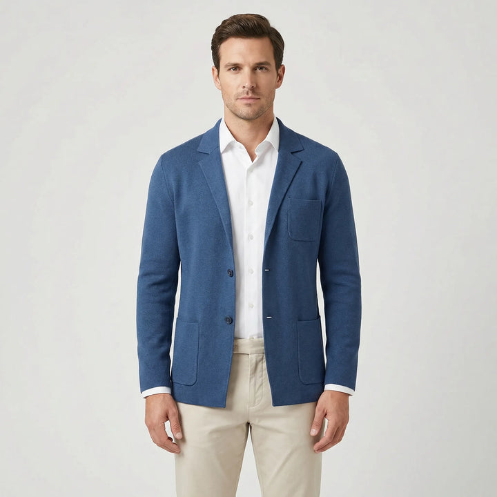 Studio portrait of a man showcasing the front view of the blue casual blazer
