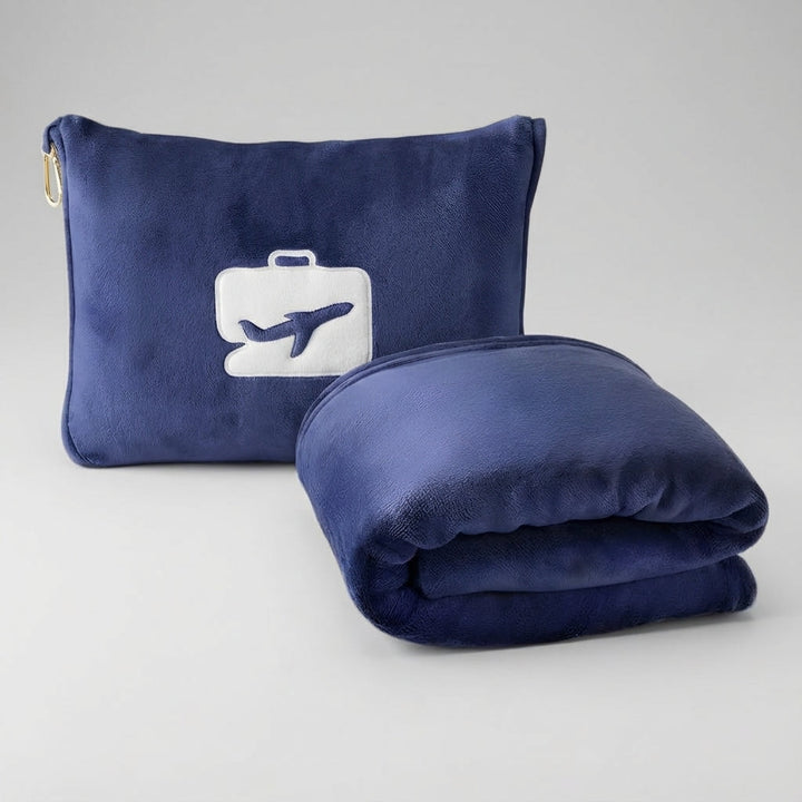 Compact portable travel set featuring a soft blanket and ergonomic pillow