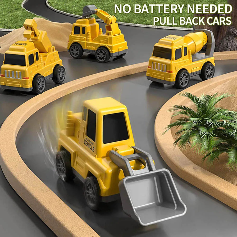 Close-up of pull back construction toy vehicles on track