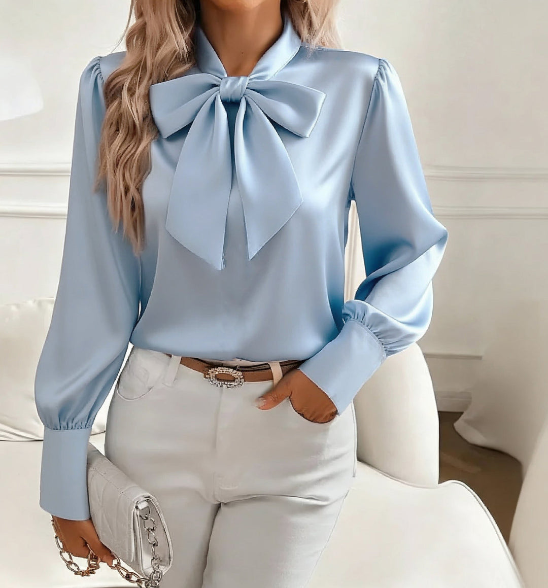 Versatile long sleeve top with bow tie detail for casual or professional looks