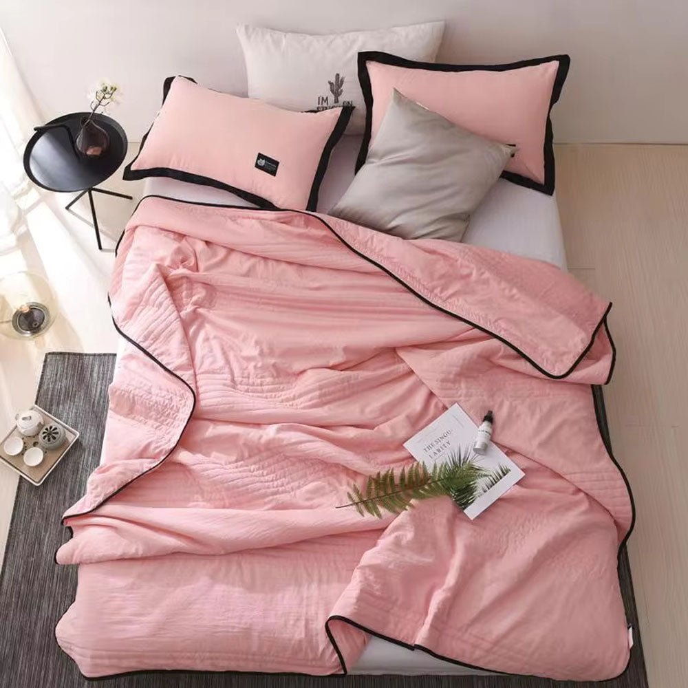 Detailed shot of the durable hem and cooling weave on the blanket