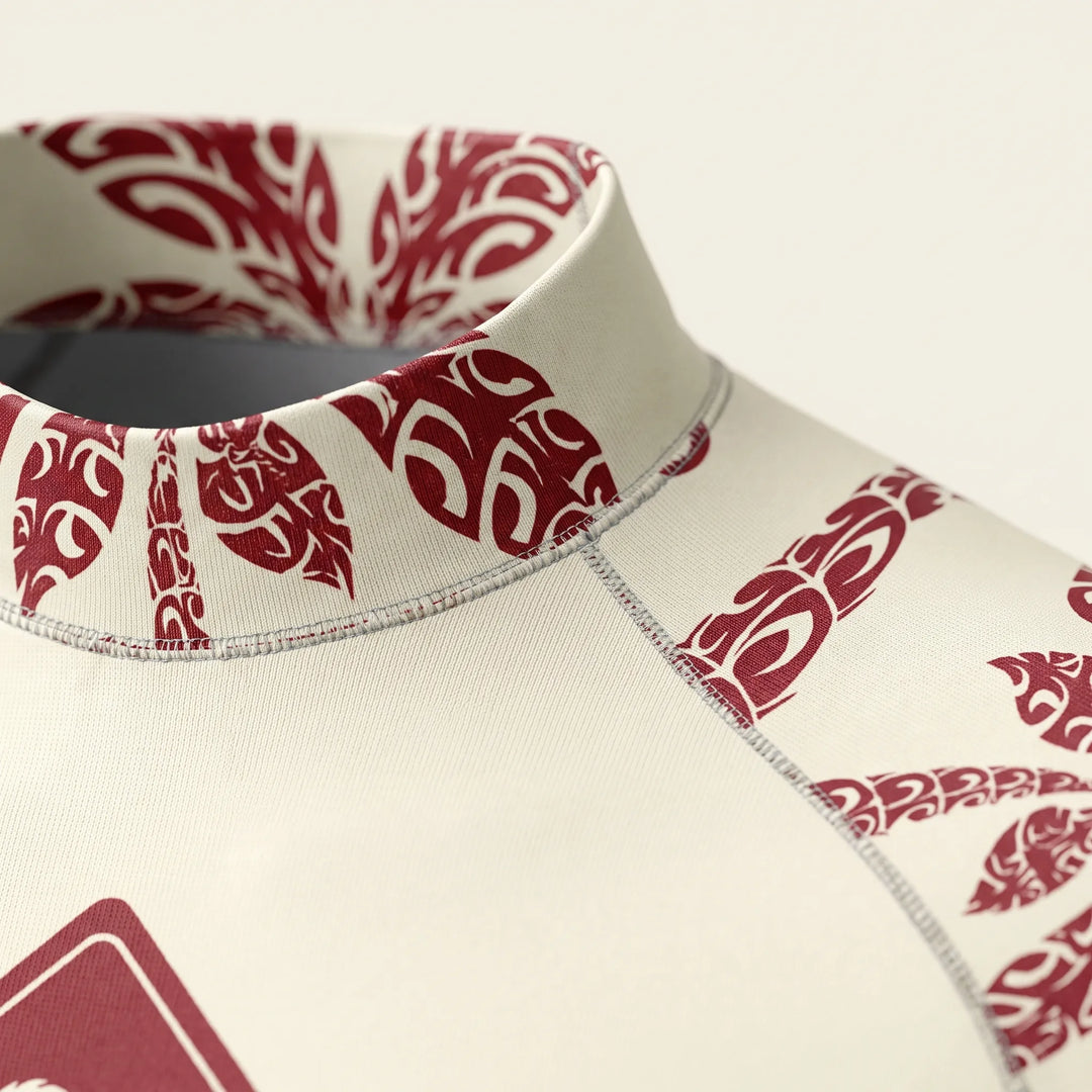 Close-up detail of the stand-up collar and patterned sleeve on a surfing rash guard