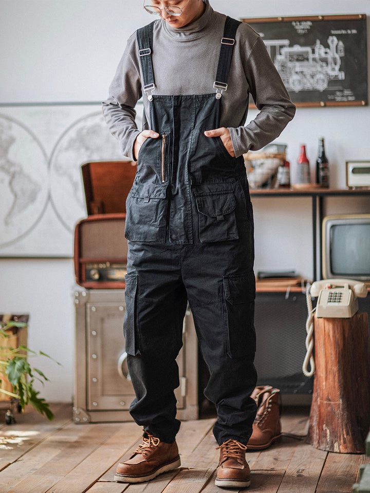 Lifestyle shot of man wearing casual outdoor utility overalls outdoors
