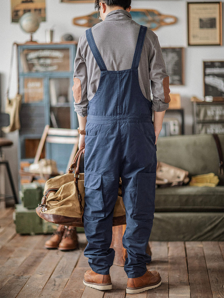 Action shot of men's outdoor pants designed for tough work environments