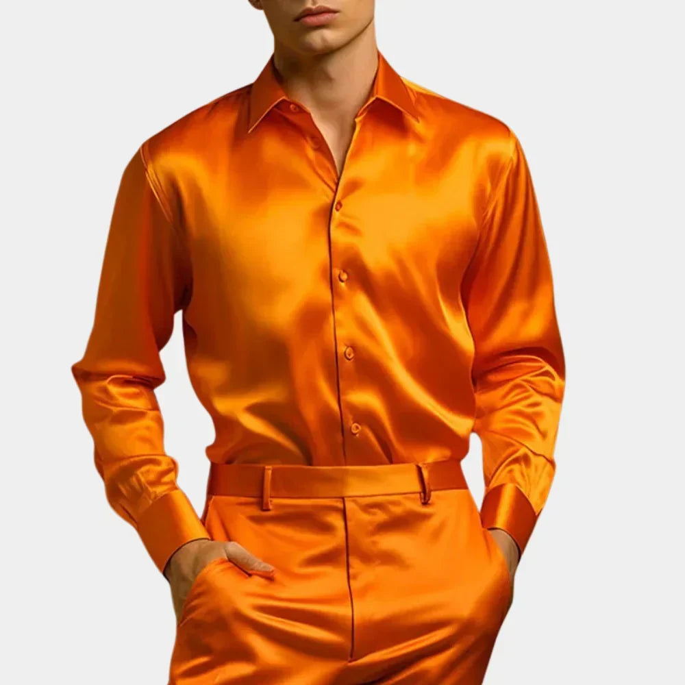 Man wearing a vibrant orange button-down shirt with long sleeves