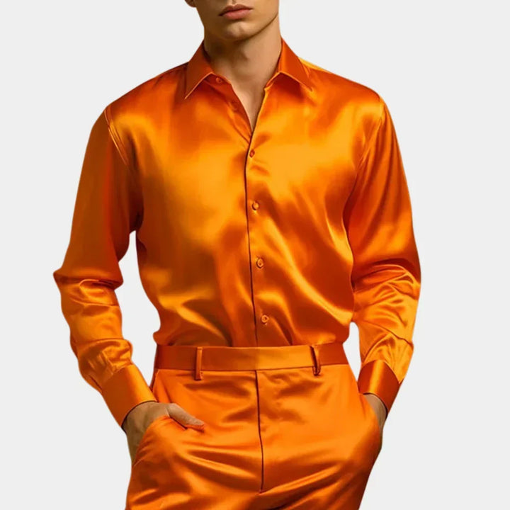 Man wearing a vibrant orange button-down shirt with long sleeves