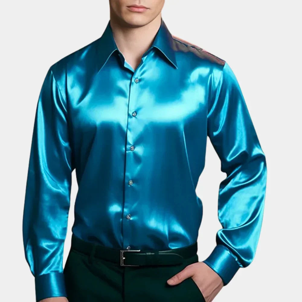 Man wearing a bright blue button-down shirt paired with dark trousers