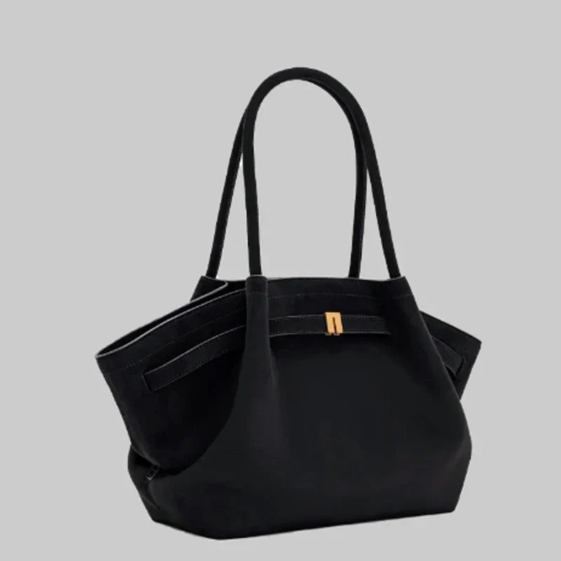Black luxury shoulder bag displayed against a neutral background
