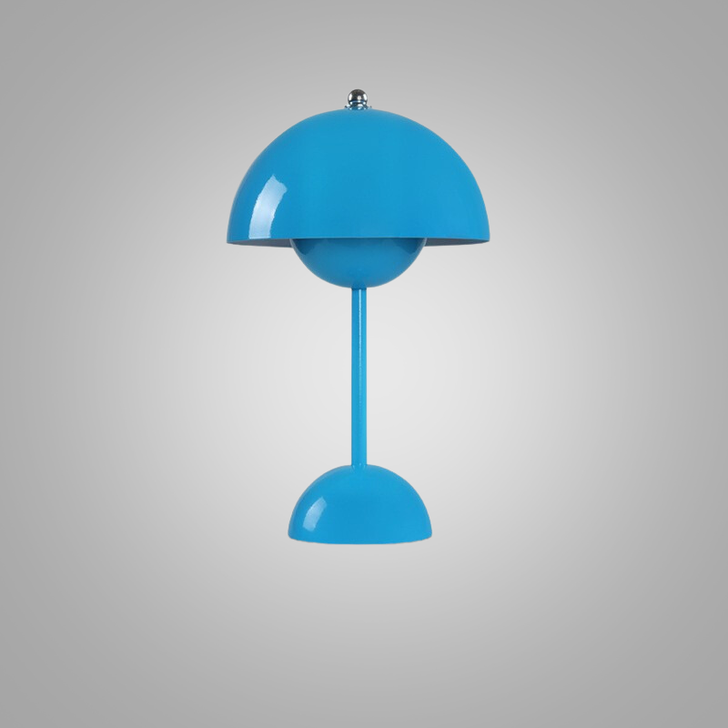 Close-up view of touch control button on a modern rechargeable table lamp