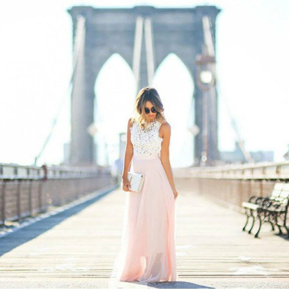 Stylish pink formal maxi dress with intricate lace detailing on the top