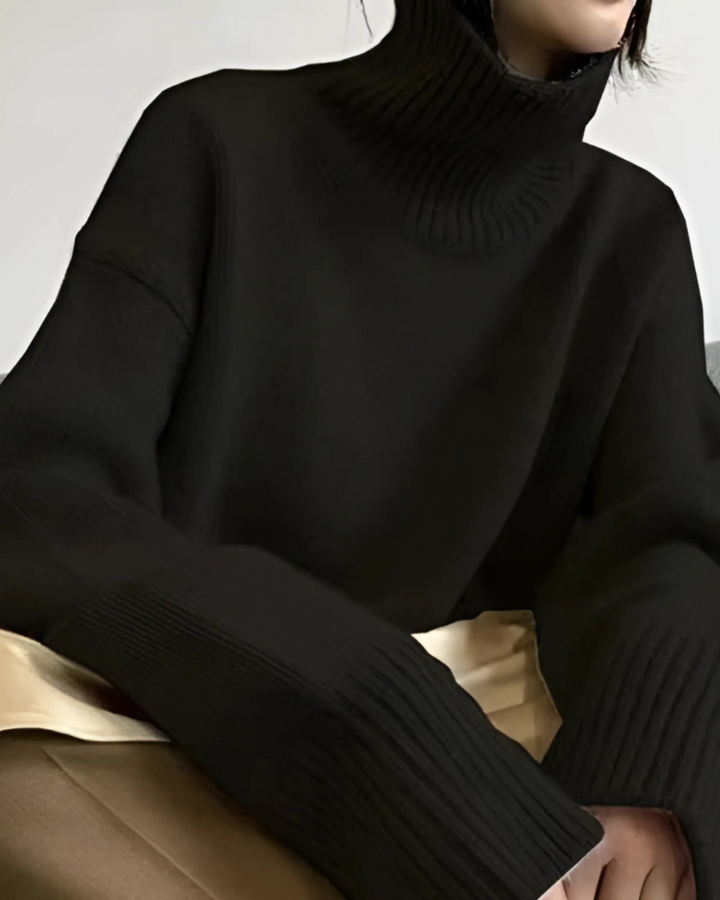 Black women's winter sweater featuring a cozy turtleneck design.