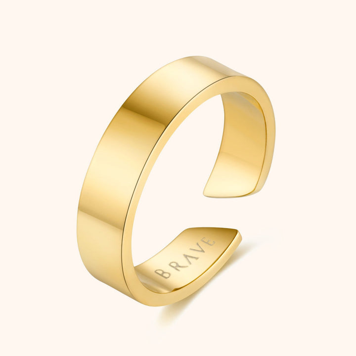 Minimalist product display of the versatile men's ring on a neutral background