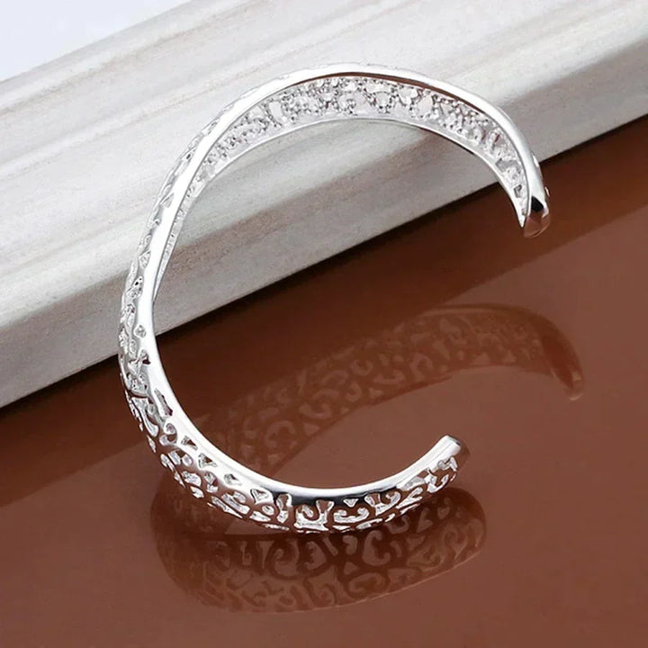 Side profile of the adjustable sterling silver filigree cuff