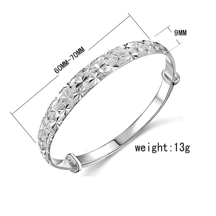 Stackable silver bracelet featuring a celestial star motif for modern womens fashion