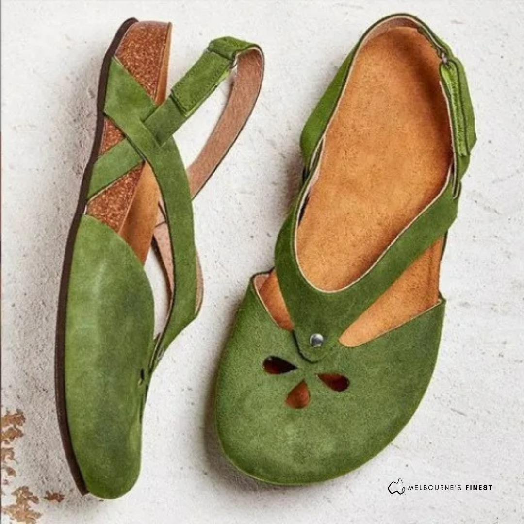 Pair of casual womens sandals with hook and loop adjustable straps