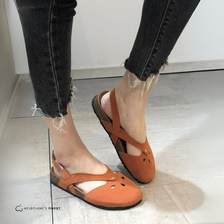 Lifestyle shot of comfortable casual shoes paired with summer clothing
