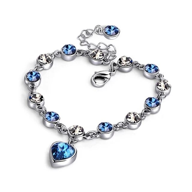 Ocean Heart Crystal Bracelet laid flat showing blue heart charm and adjustable chain