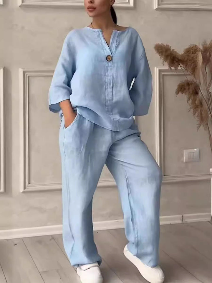 Model wearing light blue two-piece lounge set with pockets