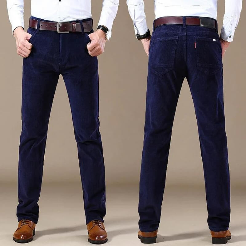Detailed shot of waistband and belt loops on mens vintage style slim fit trousers