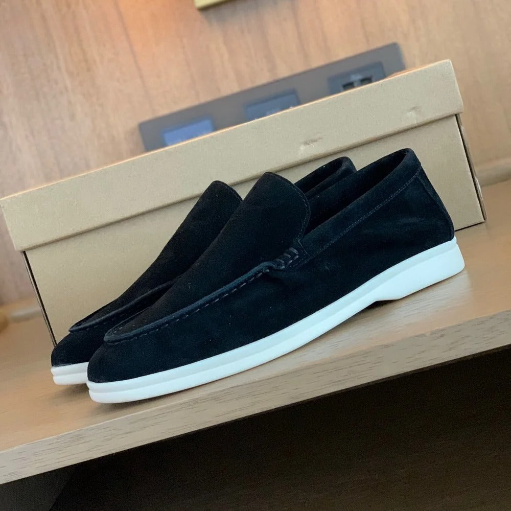 Close-up detail of stitching and texture on mens classic slip-on shoes