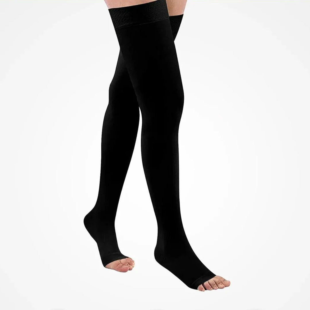 Black thigh high compression stockings worn on legs