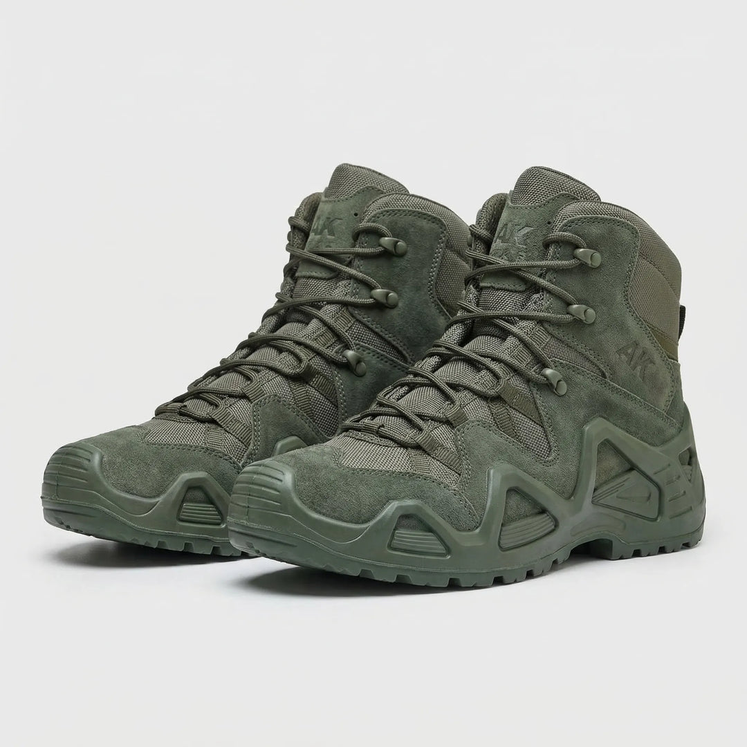 Pair of mens tactical mid-height outdoor boots ready for adventure