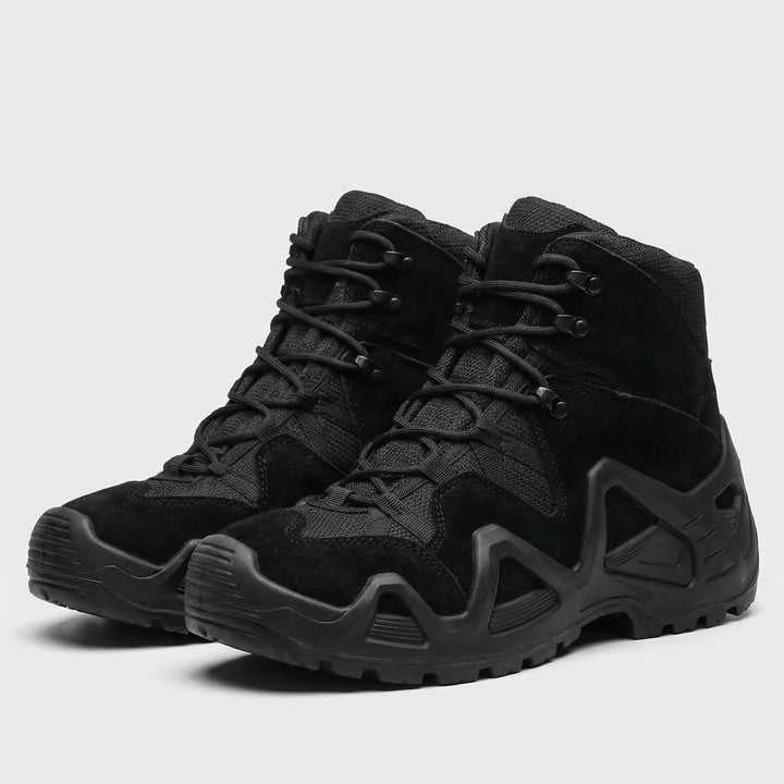 Studio view of men's black tactical outdoor boots showing lace-up design