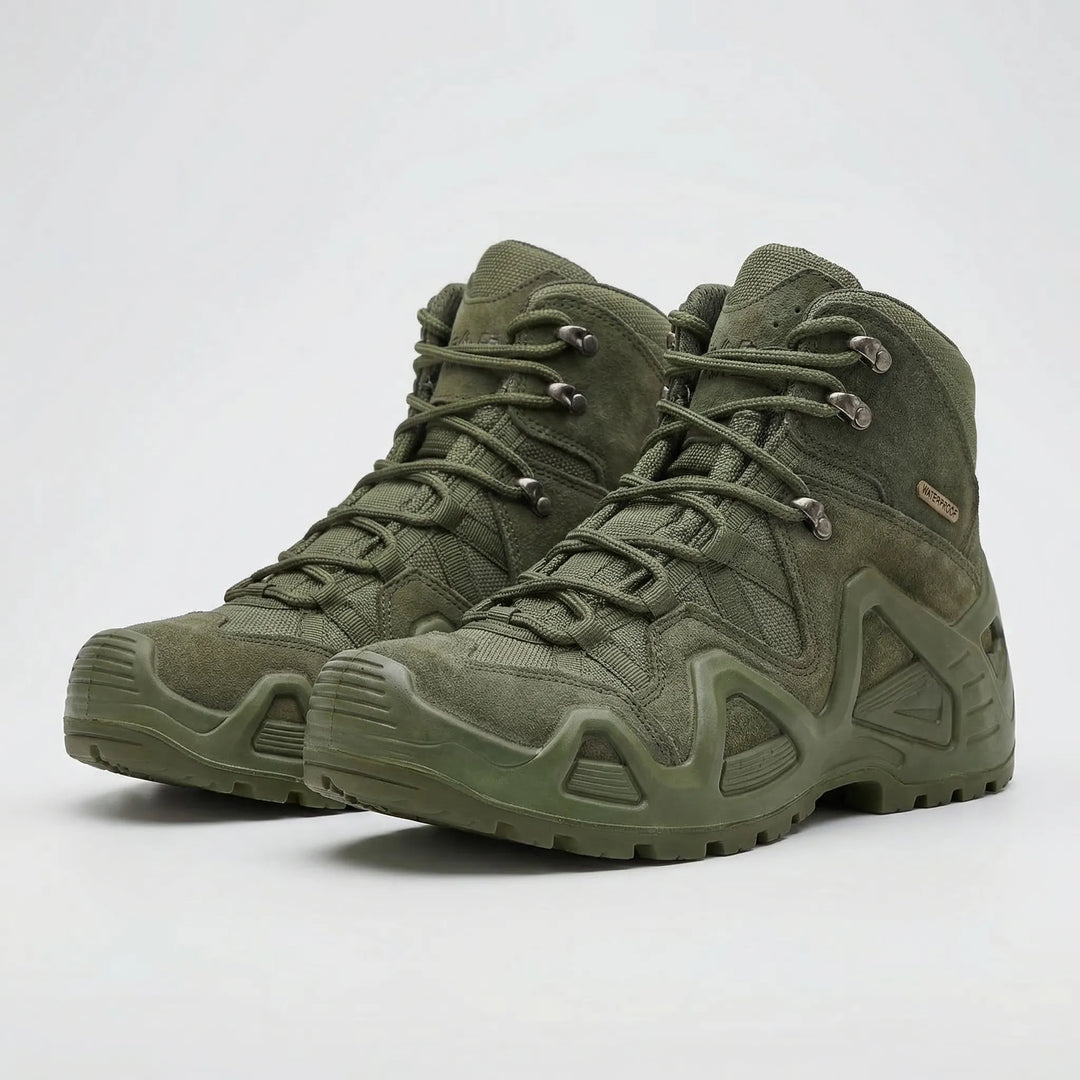 Mens hiking boots and outdoor footwear in rugged terrain setting