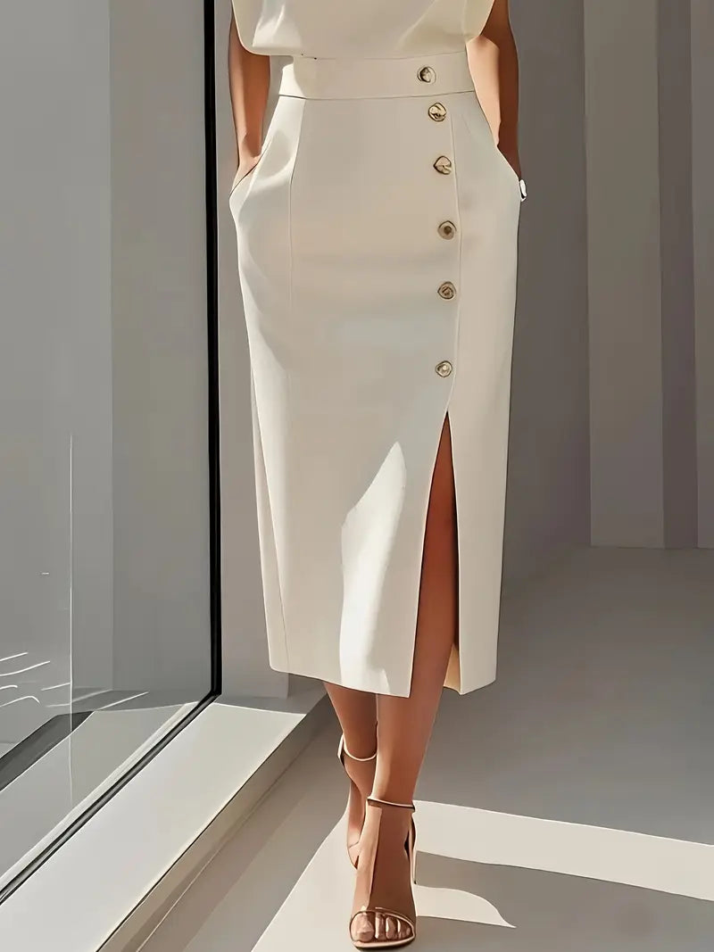 Back view of the fashionable party dress showing the clean tailoring and graceful midi length hem