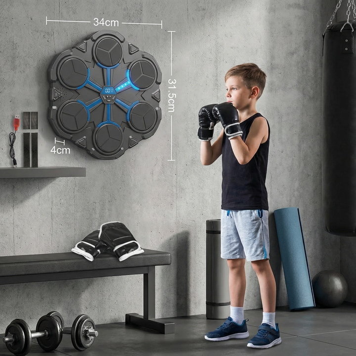 Wall-mounted bluetooth music boxing trainer displaying interactive LED punching targets for home workouts