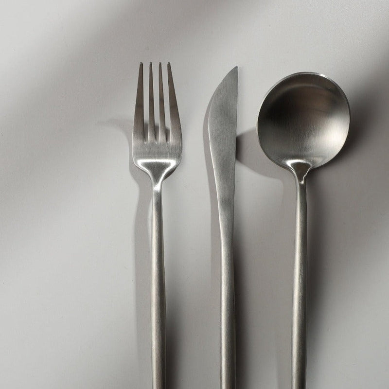 Minimalist flatware arrangement displaying clean lines and modern appeal