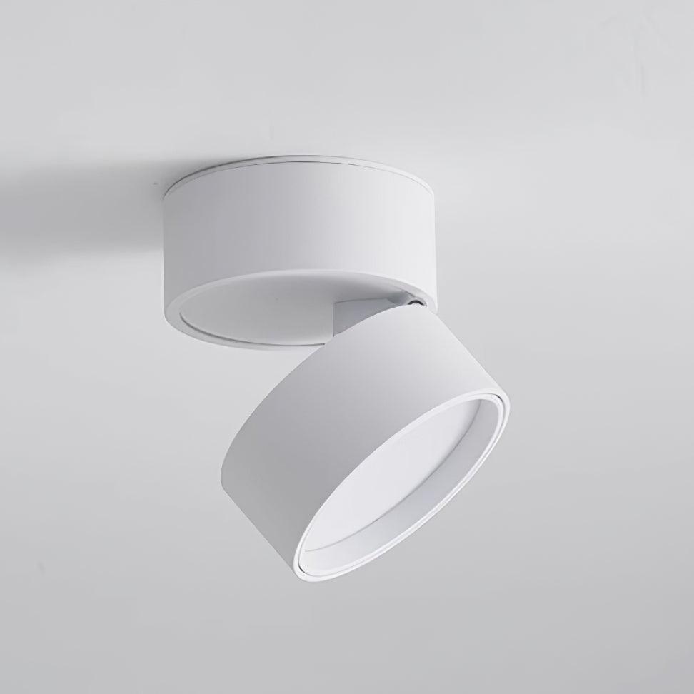 Modern spotlight fixture illuminating a hallway corridor