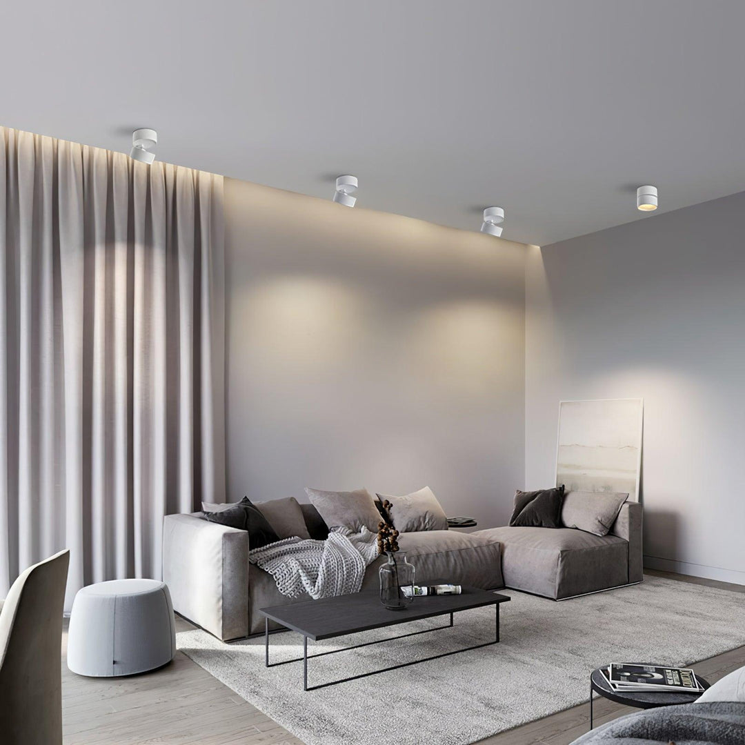 Minimalist LED spotlight fixture mounted on white ceiling