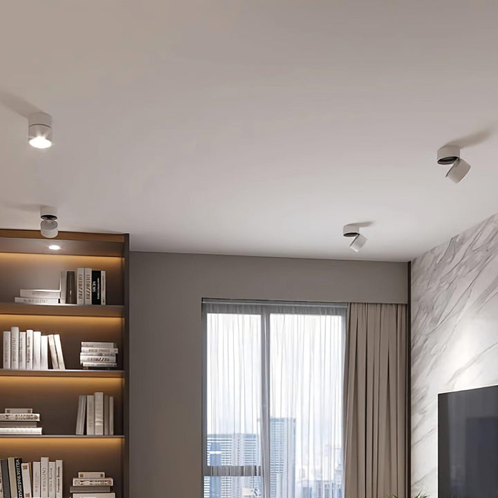 Modern lighting fixture casting warm white light downward