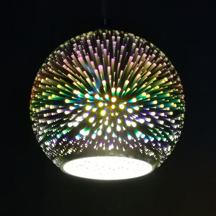 Designer glass hanglamp adding artistic flair to interior spaces