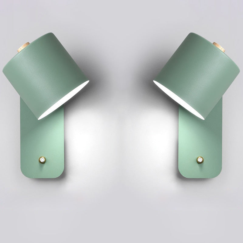 Warm indoor lighting emitted by the contemporary wall mount light fixture