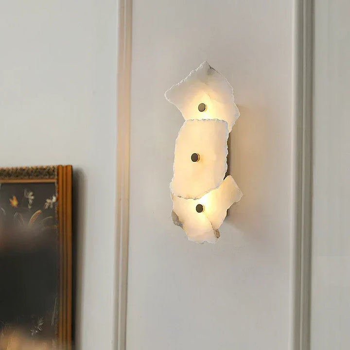 Close-up of the overlapping translucent panels and metallic accents