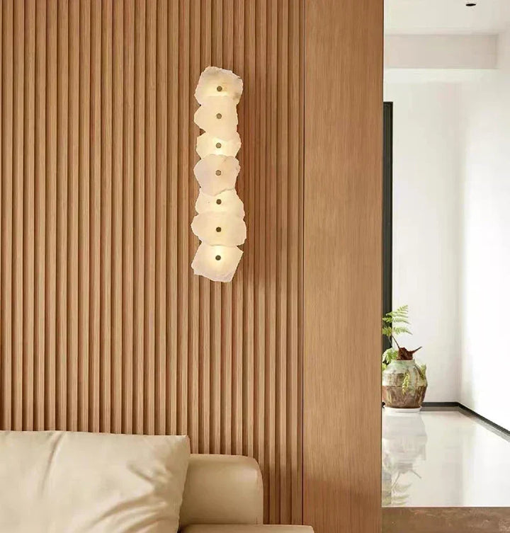 Modern LED wall sconce featuring natural alabaster stone panels for ambient hallway lighting