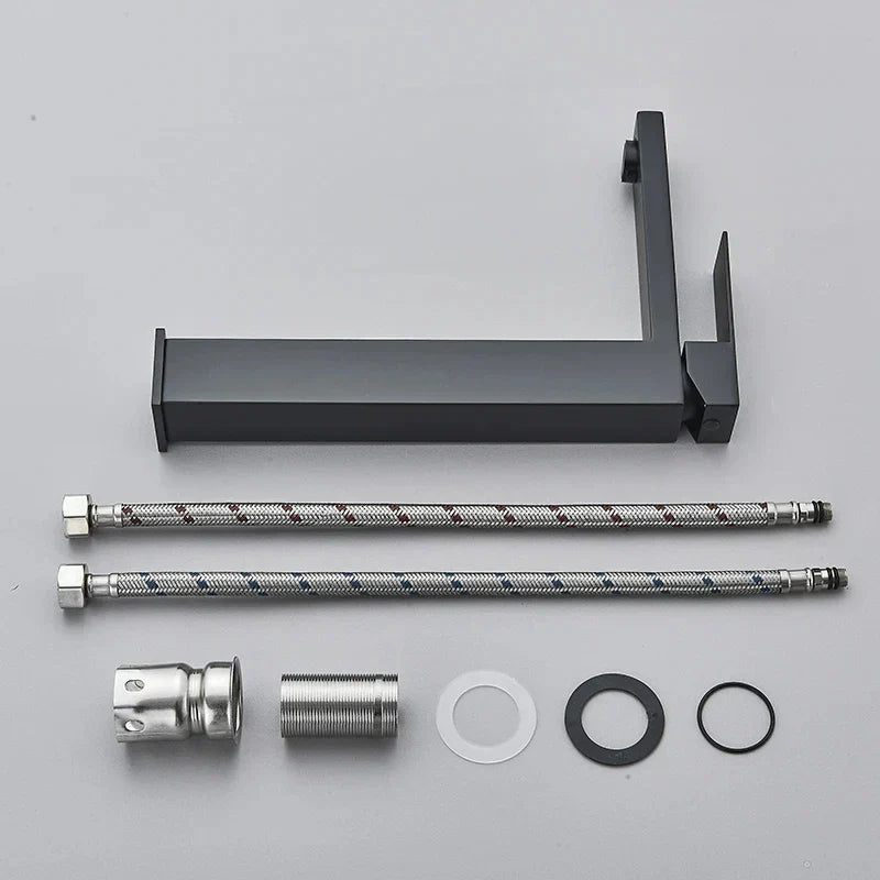 Sleek sink mixer tap in black and silver designed for contemporary bathroom hardware
