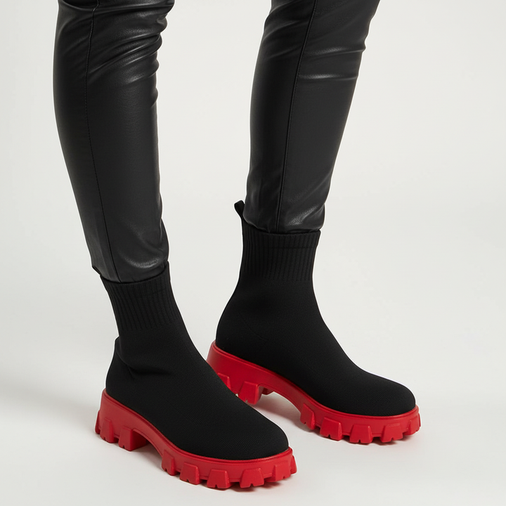 Side profile of women's fashionable platform boots with stretchy sock ankle design