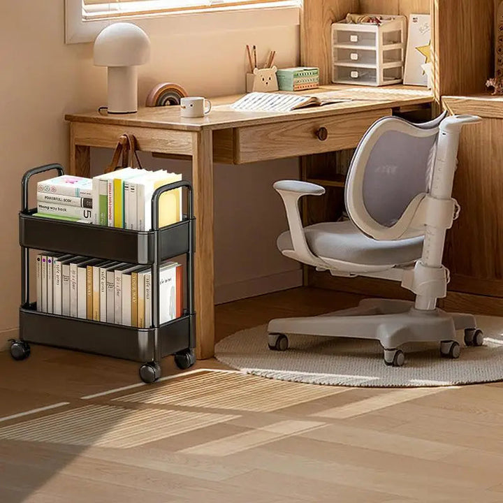 Black storage trolley with books placed in a bright study room