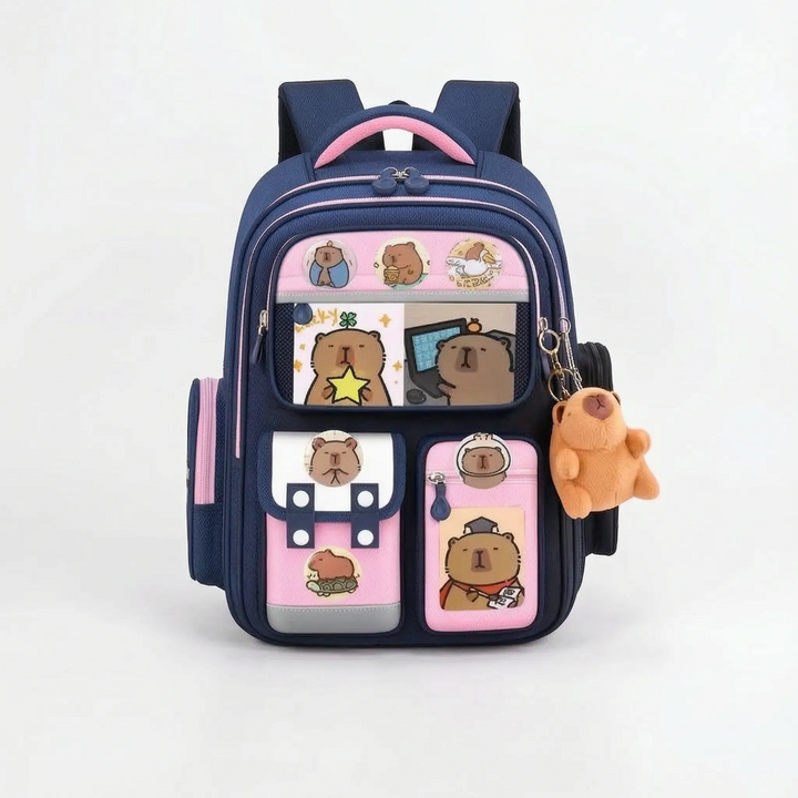 Child wearing the cute capybara school rucksack, demonstrating size and fit