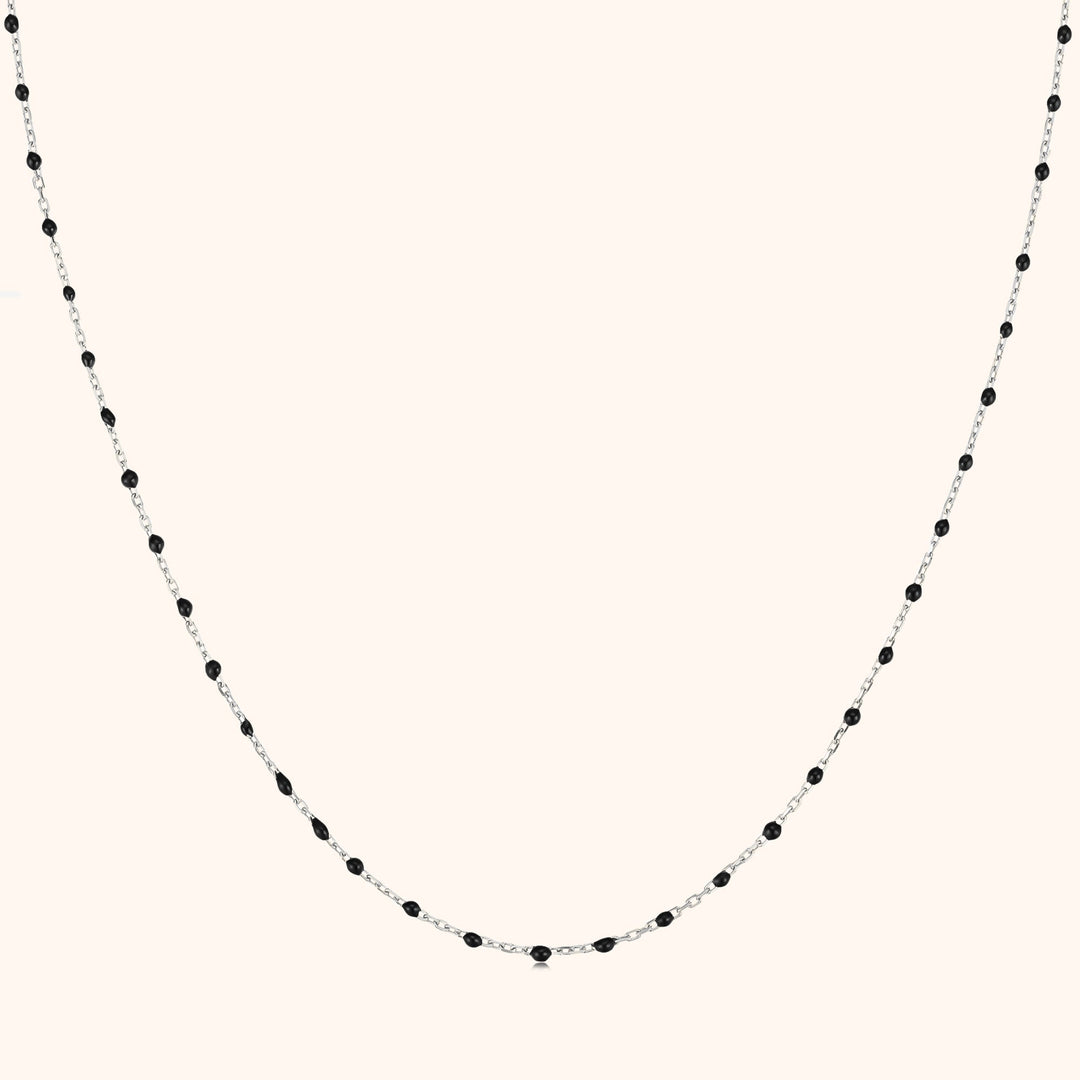 Close-up of elegant black pearl pendant necklace for women as a gift for her
