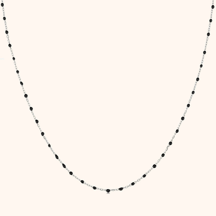 Close-up of elegant black pearl pendant necklace for women as a gift for her