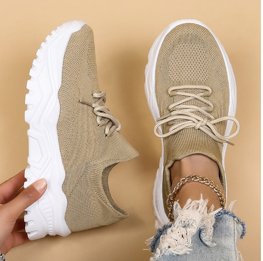 Beige women's orthopedic walking sneakers featuring breathable upper design