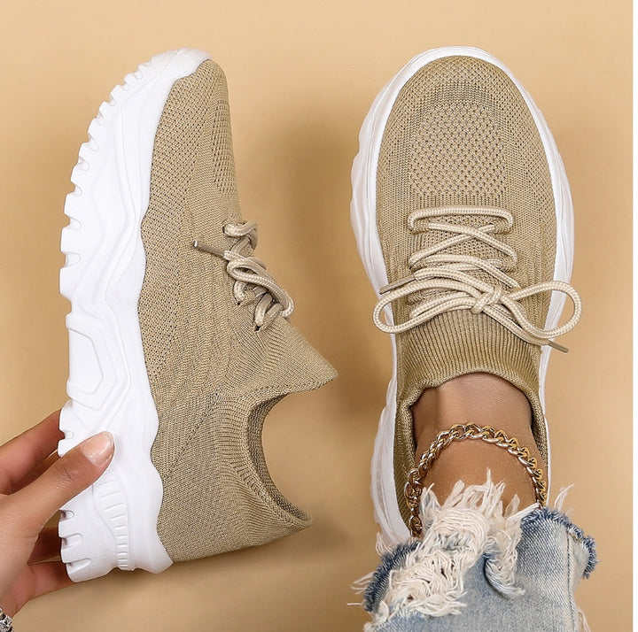 Beige women's orthopedic walking sneakers featuring breathable upper design