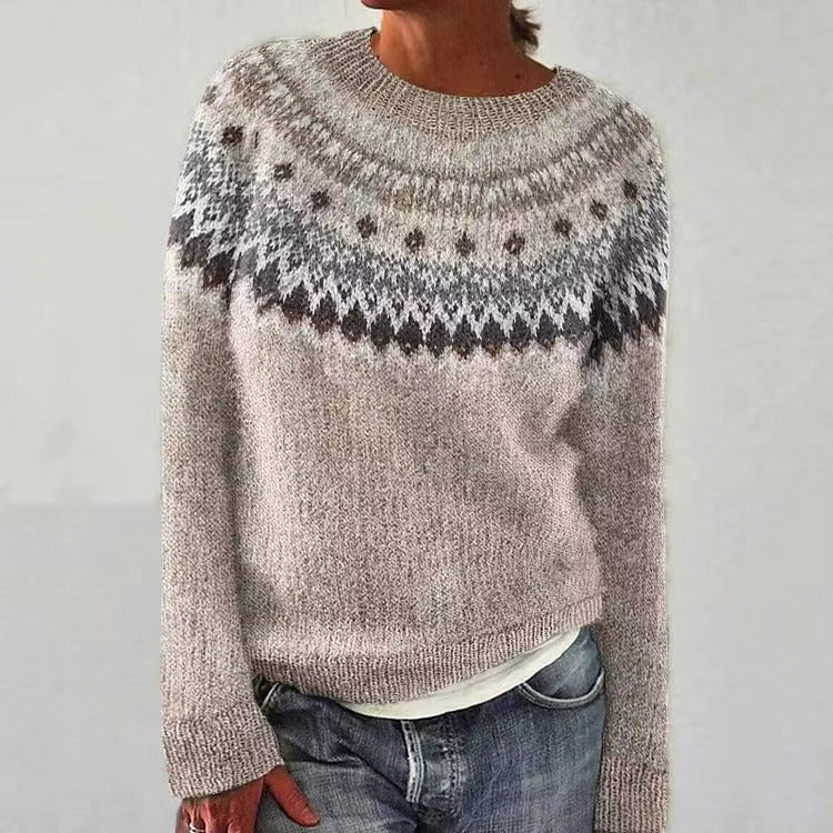Woman wearing a gray Fair Isle pattern crew neck sweater