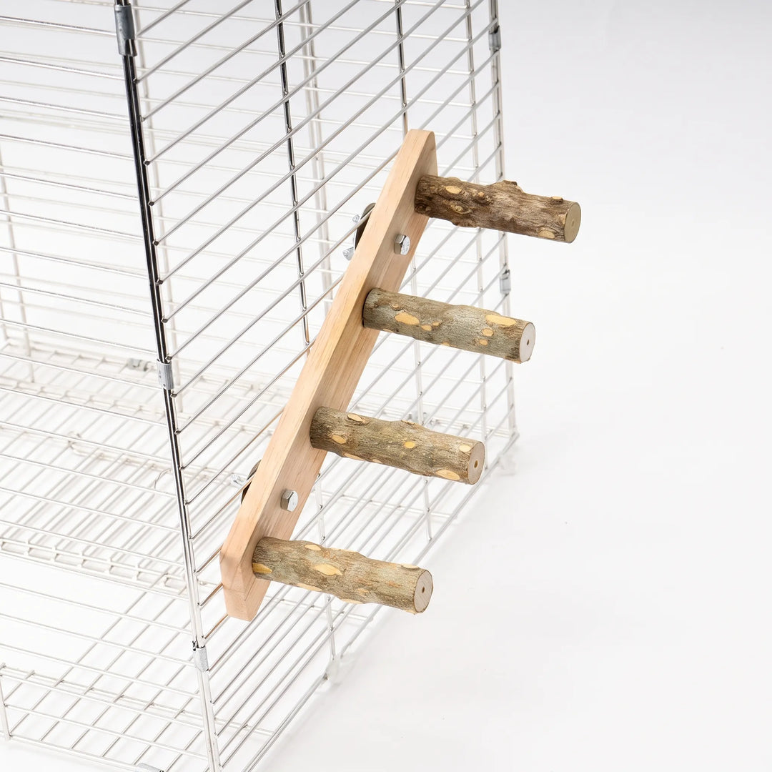 Natural wood bird ladder mounted inside a wire pet cage