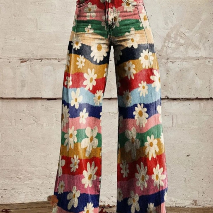 Front view of women's retro flared high-waisted floral trousers